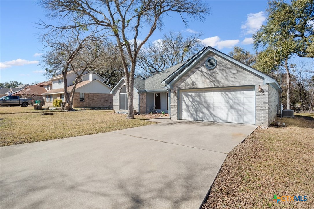 8 Sycamore Court Belton, TX 76513 - Photo 6 of 30 a view of house with a yard and covered with snow