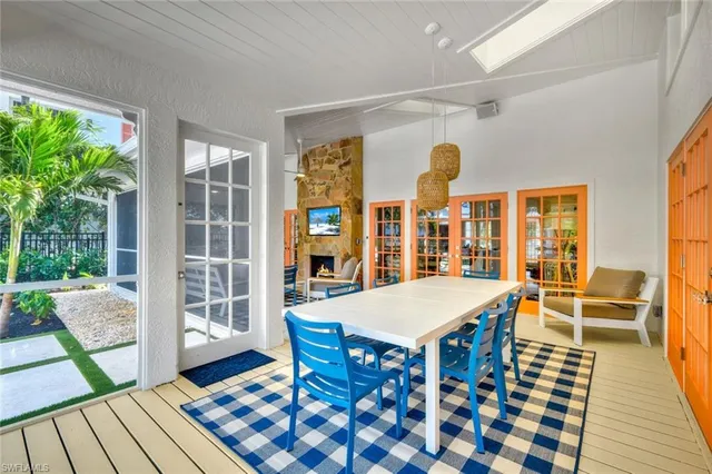 a front view of house with yard and swimming pool