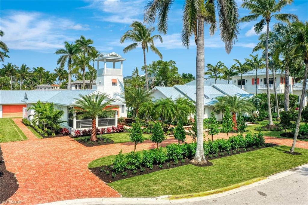 67 8th Avenue South Naples, FL 34102 - Photo 30 of 38 a view of outdoor space yard and porch