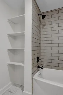 a bathroom with a bathtub