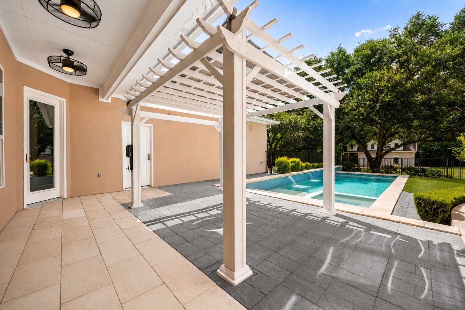 6039 Franz Road Katy, TX 77493 - Photo 37 of 49 A power-ready pergola shades the paver patio just off the kitchen and breakfast area, offering a flexible space for outdoor dining or lounging beside the pool.