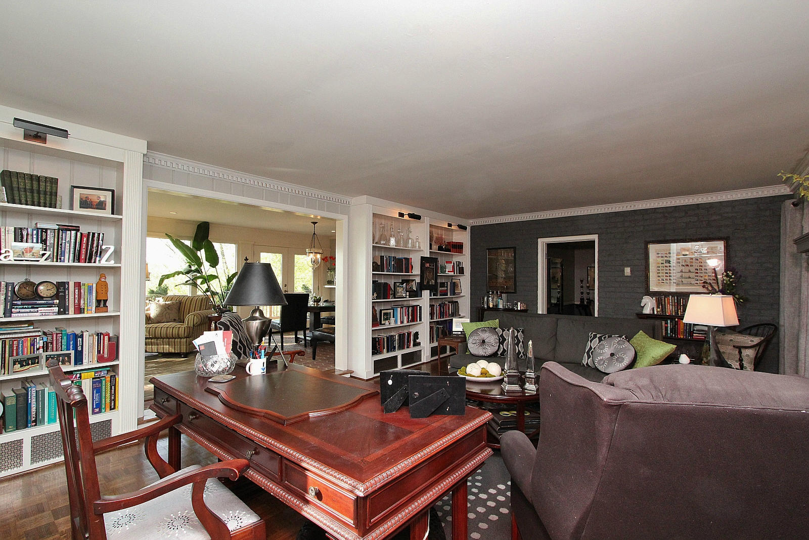 3232 Fordham Road Southwest Roanoke, VA 24014 - Photo 13 of 36 a living room with furniture a bookshelf and a large window