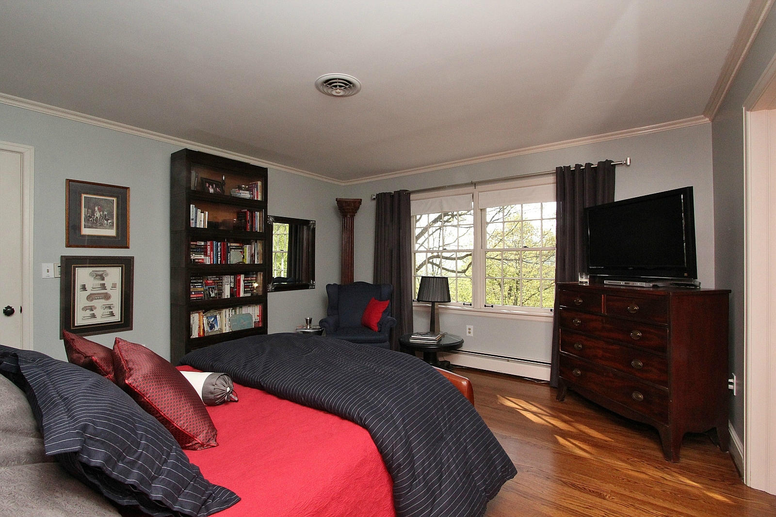 3232 Fordham Road Southwest Roanoke, VA 24014 - Photo 19 of 36 a bedroom with a bed and a flat screen tv