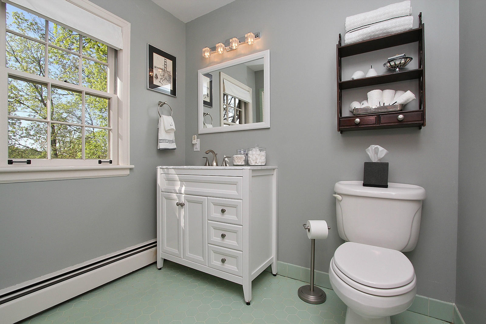 3232 Fordham Road Southwest Roanoke, VA 24014 - Photo 20 of 36 a bathroom with a toilet a sink and a window