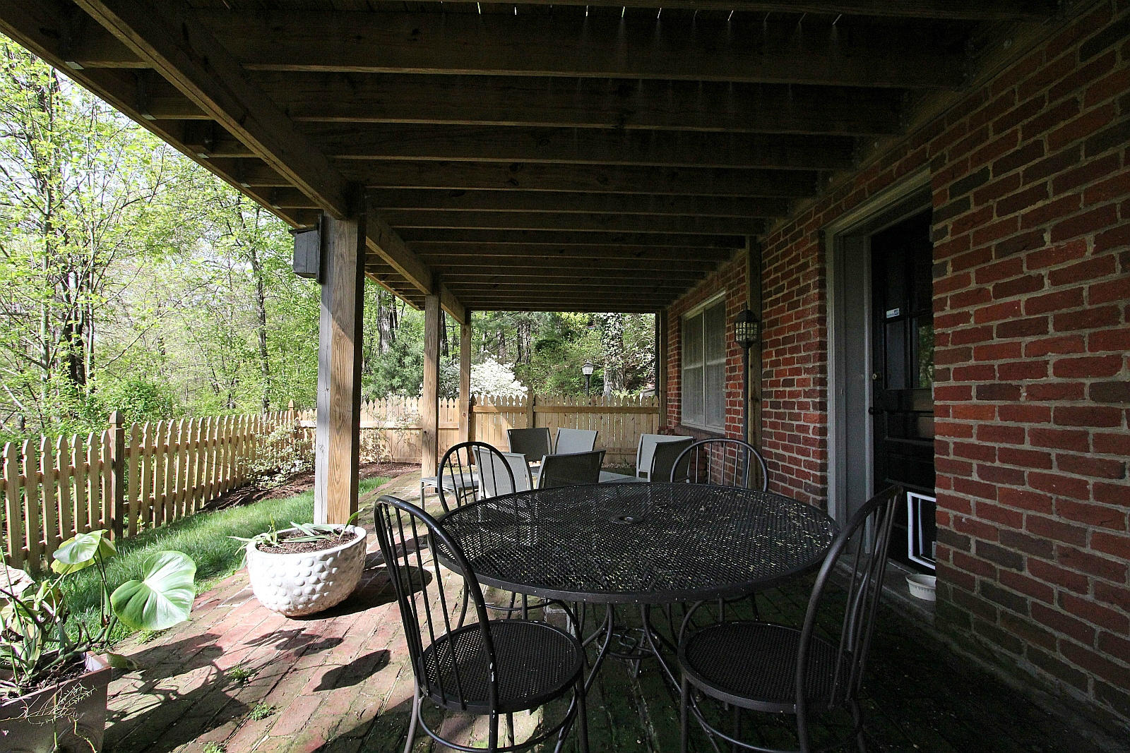 3232 Fordham Road Southwest Roanoke, VA 24014 - Photo 30 of 36 a view of a porch with furniture and wooden floor