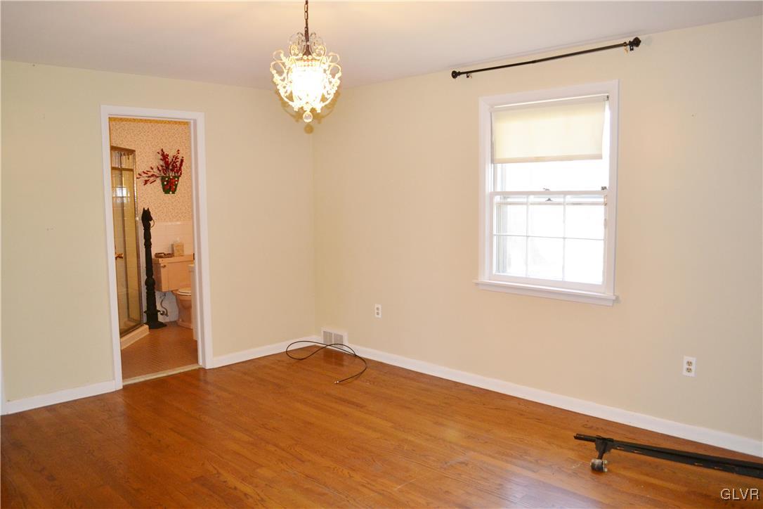 355 Wedgewood Road Bethlehem, PA 18017 - Photo 17 of 27 Master bedroom with hardwood floors and en-suite b