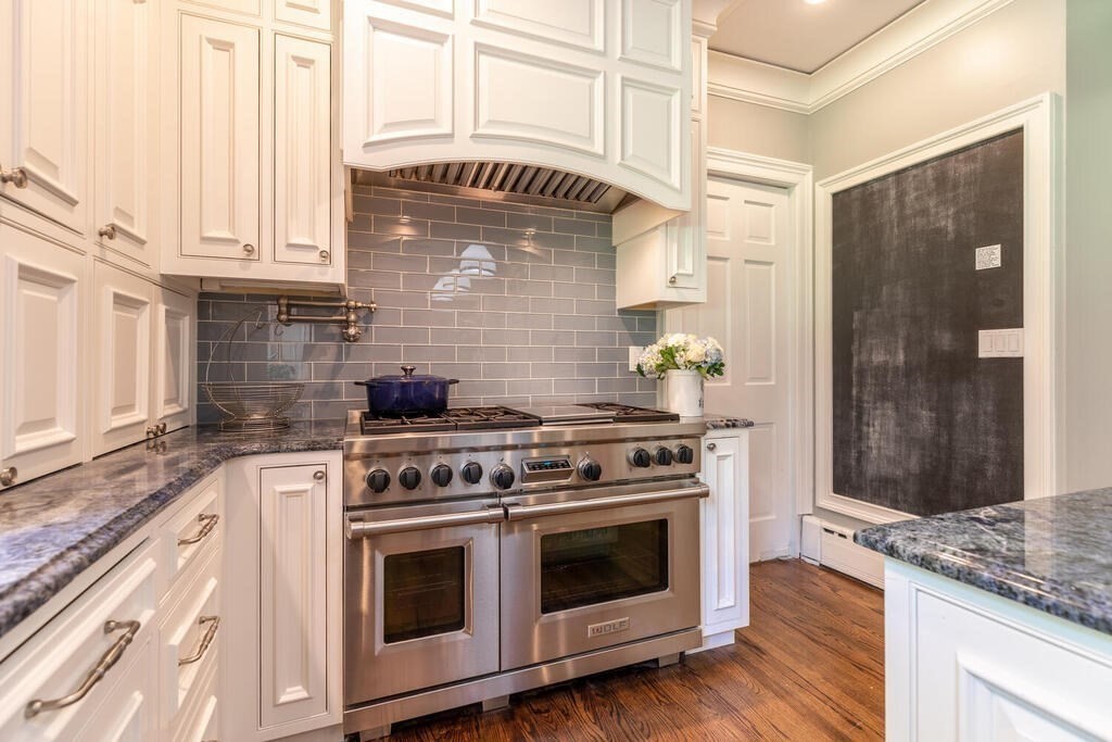 6 Hampton Road Lexington, MA 02421 - Photo 17 of 41 a kitchen with granite countertop a stove and a sink