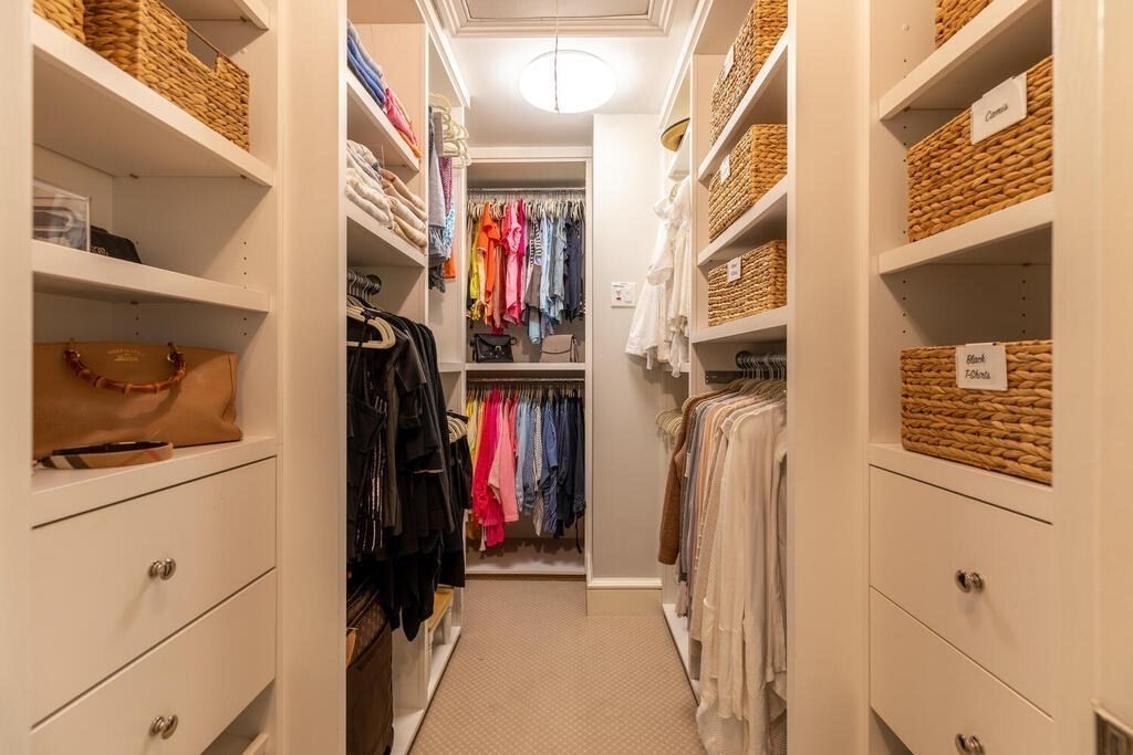 6 Hampton Road Lexington, MA 02421 - Photo 23 of 41 a view of walk in closet with clothes and shoes