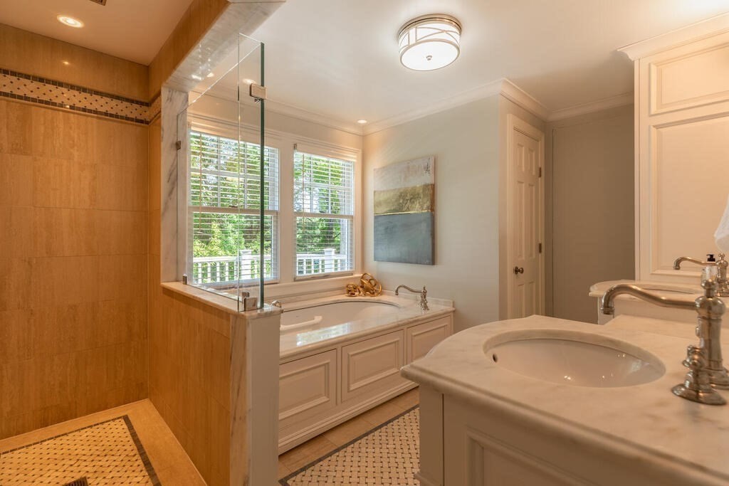 6 Hampton Road Lexington, MA 02421 - Photo 24 of 41 a bathroom with a sink and a bathtub