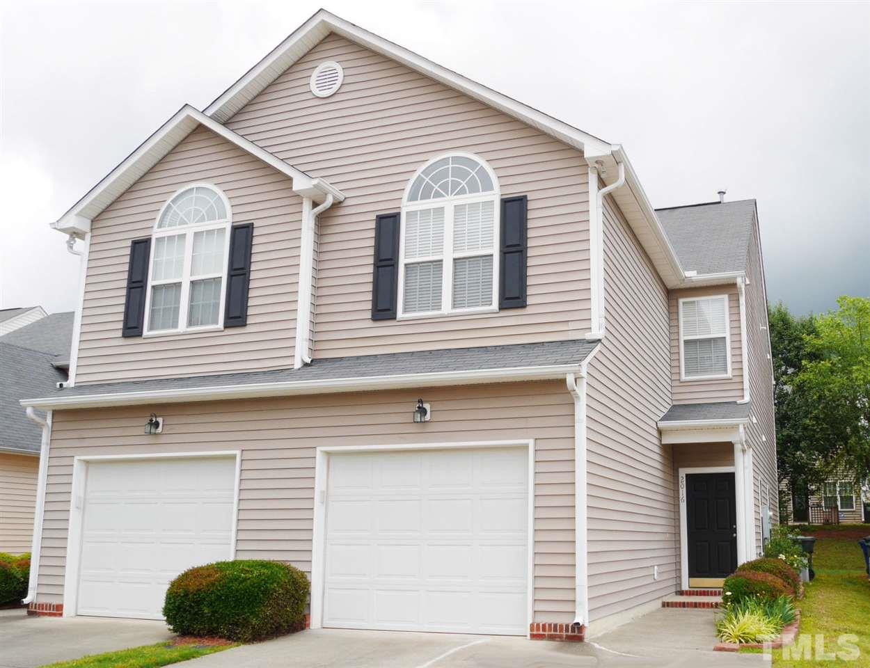2016 Metacomet Way Raleigh, NC 27604 - Photo 1 of 24 a view of a house with a yard and large tree