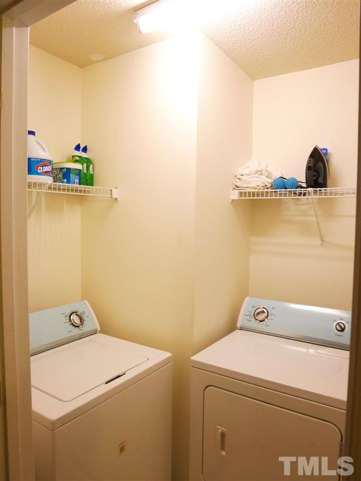 2016 Metacomet Way Raleigh, NC 27604 - Photo 19 of 24 a utility room with dryer and washer