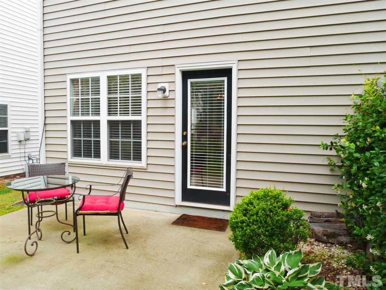 2016 Metacomet Way Raleigh, NC 27604 - Photo 20 of 24 a balcony with furniture and a potted plant