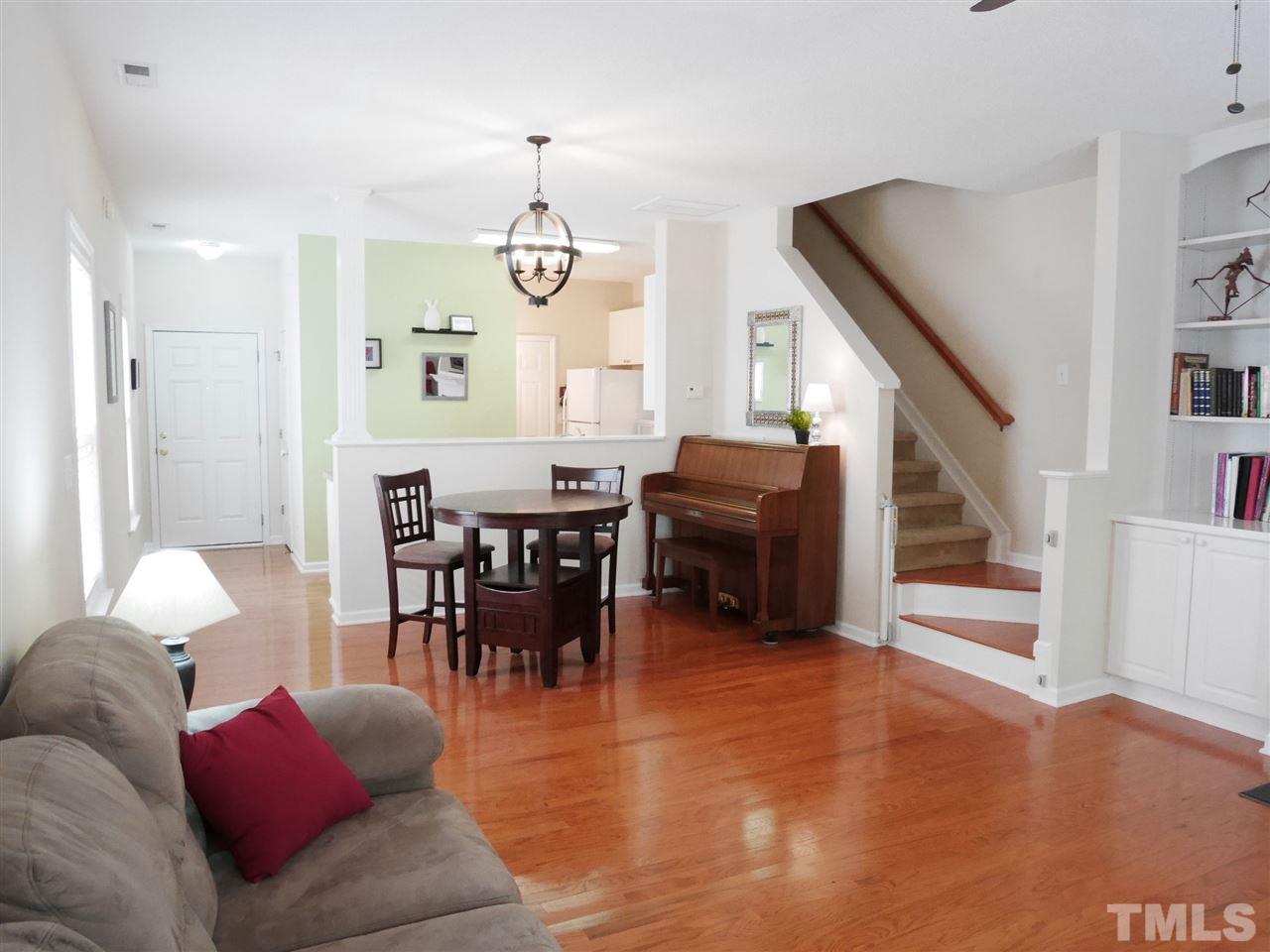2016 Metacomet Way Raleigh, NC 27604 - Photo 8 of 24 a living room with furniture kitchen view and a wooden floor