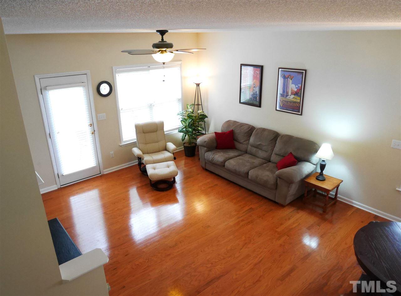 2016 Metacomet Way Raleigh, NC 27604 - Photo 9 of 24 a living room with furniture and a wooden floor