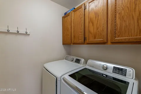 a utility room with dryer and washer