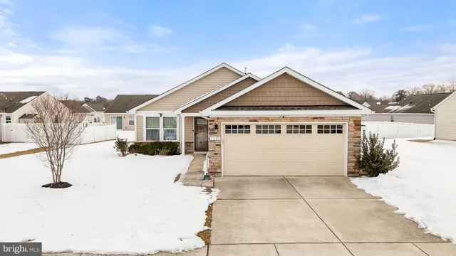 a view of a house with basketball court
