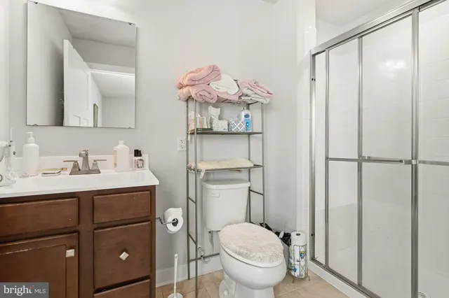a view of a livingroom with furniture and a flat screen tv
