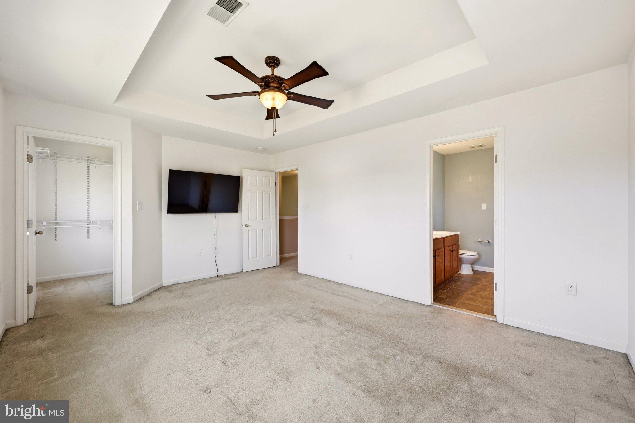 486 Calvert Circle Bunker Hill, WV 25413 - Photo 23 of 52 a view of a livingroom with a flat screen tv