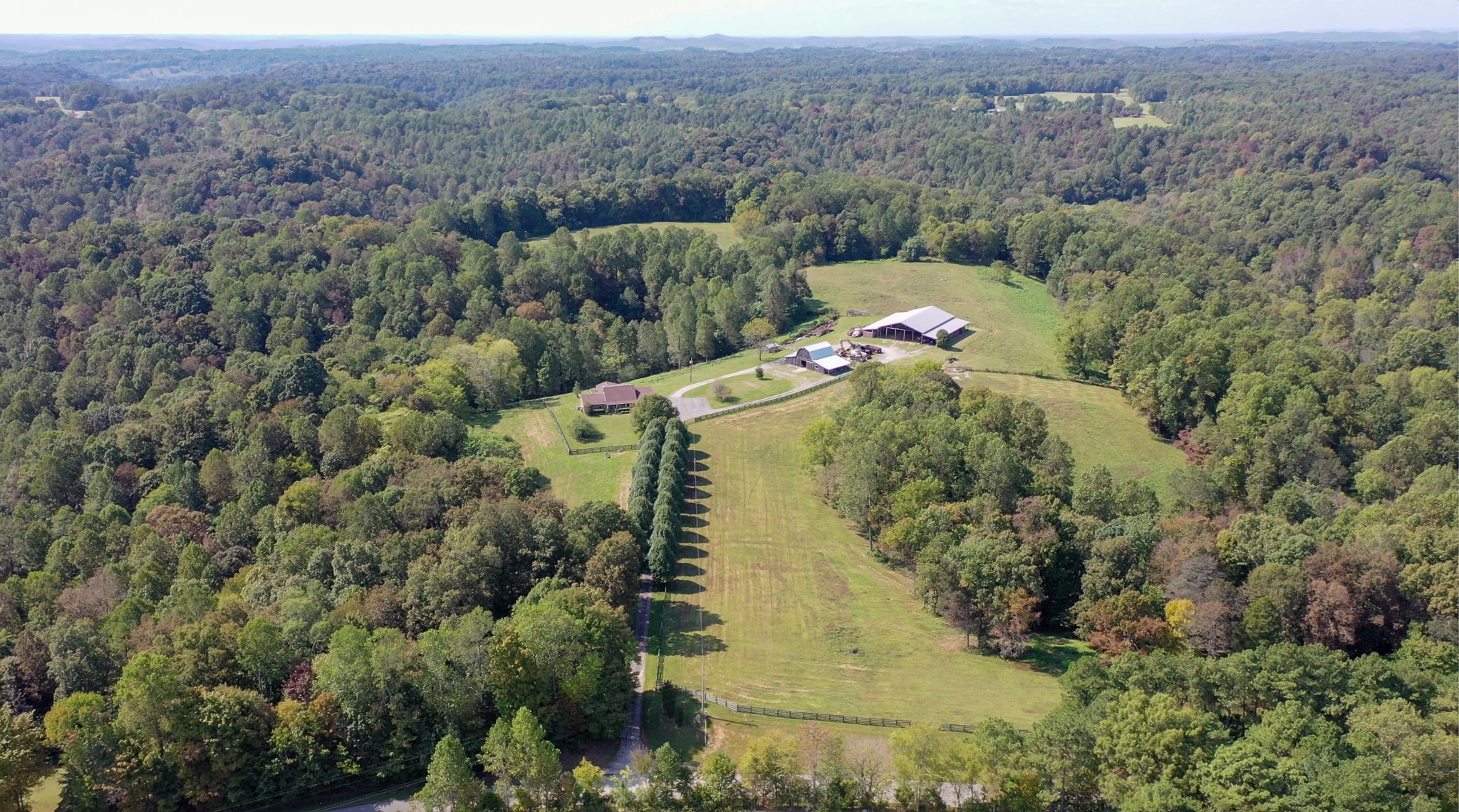 4741 Cathey Ridge Road Manchester, TN 37355 - Photo 1 of 50 an aerial view of a house with a yard and trees