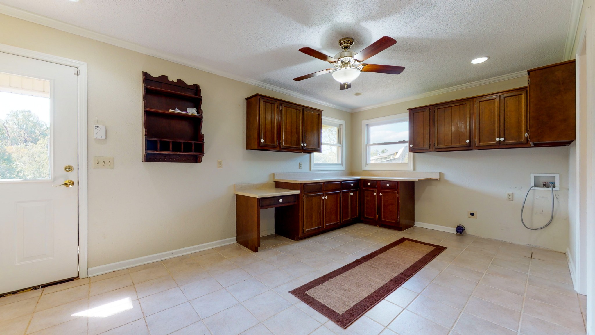 4741 Cathey Ridge Road Manchester, TN 37355 - Photo 18 of 50 a kitchen with stainless steel appliances granite countertop a stove a sink and a microwave