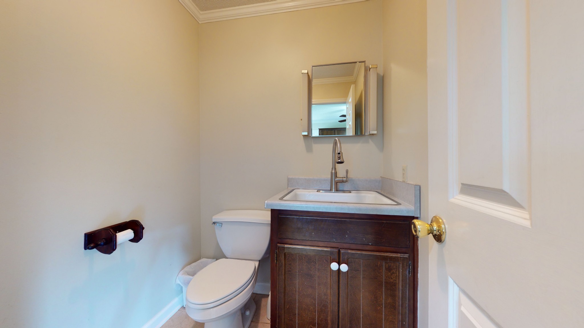 4741 Cathey Ridge Road Manchester, TN 37355 - Photo 19 of 50 a bathroom with a toilet a sink and mirror