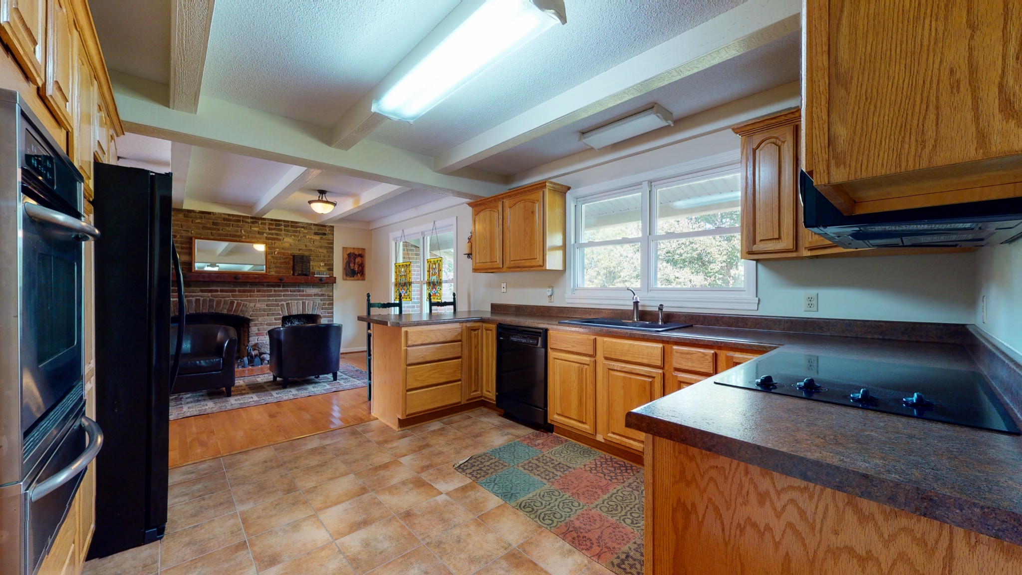 4741 Cathey Ridge Road Manchester, TN 37355 - Photo 28 of 50 a kitchen with stainless steel appliances granite countertop sink stove and cabinets