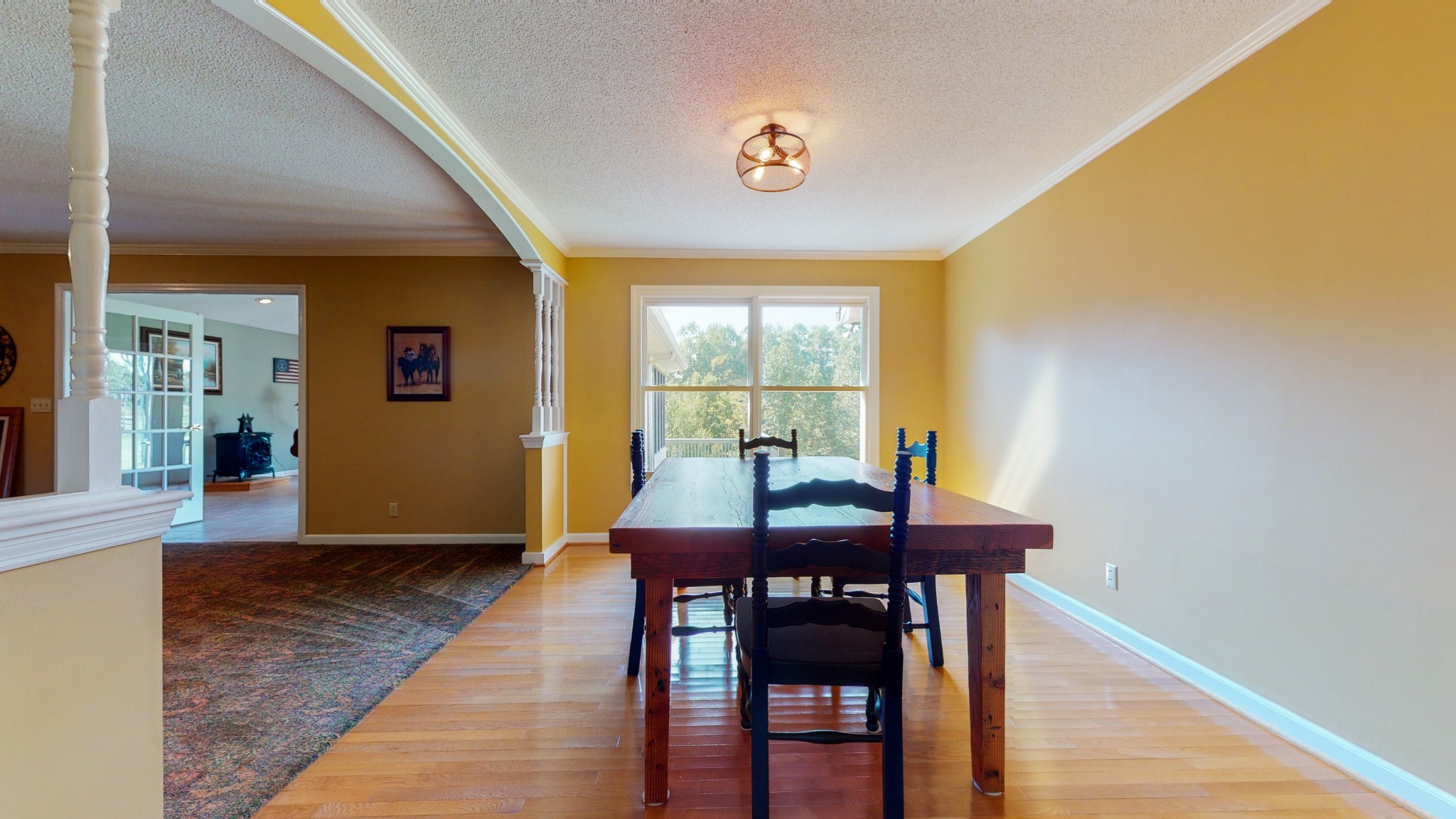4741 Cathey Ridge Road Manchester, TN 37355 - Photo 29 of 50 a view of a dining room with furniture and wooden floor