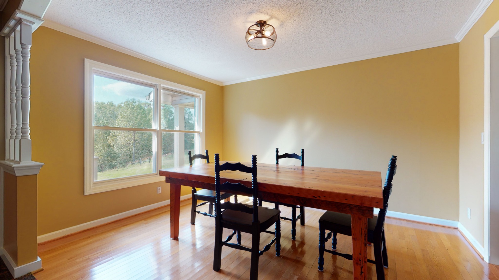 4741 Cathey Ridge Road Manchester, TN 37355 - Photo 32 of 50 a view of a dining room with furniture and wooden floor