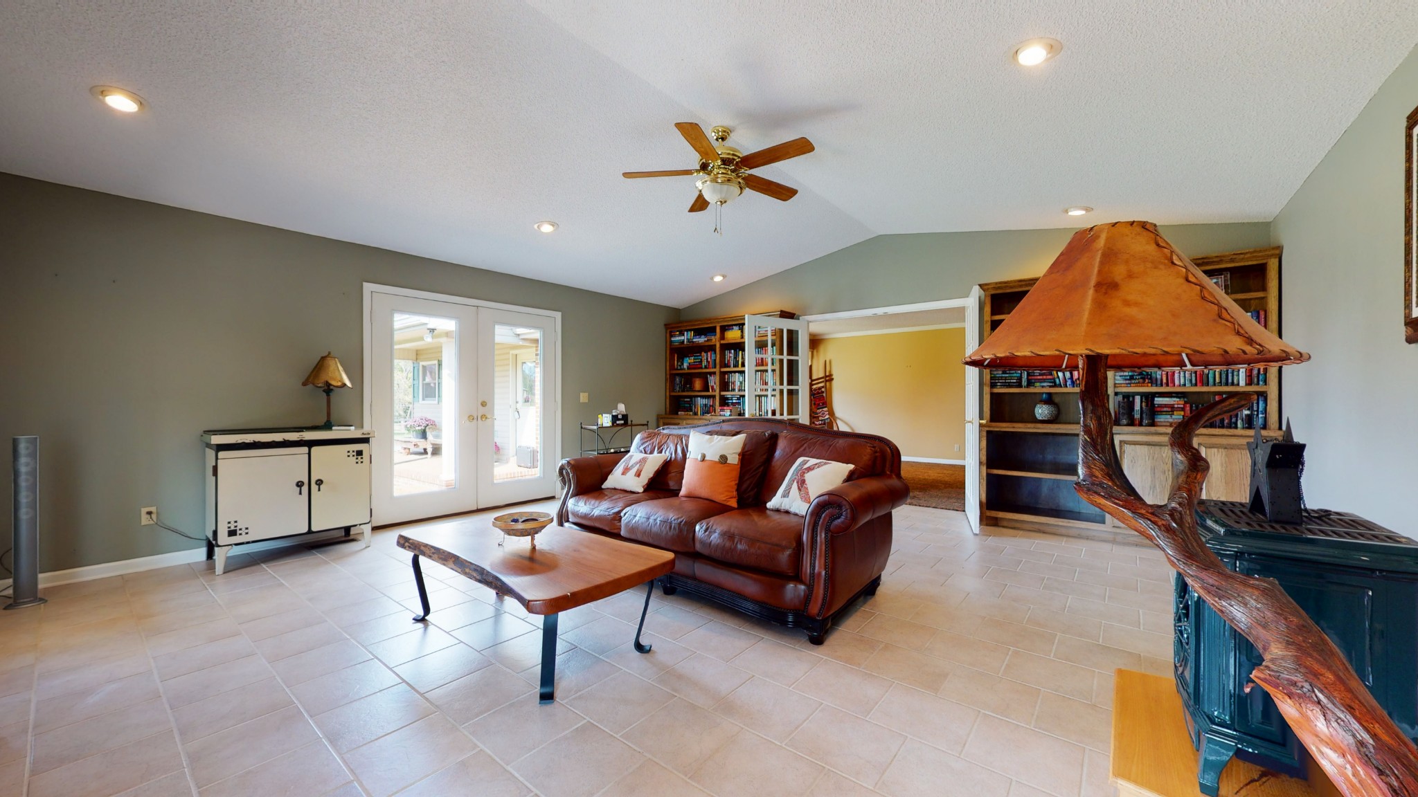4741 Cathey Ridge Road Manchester, TN 37355 - Photo 38 of 50 a living room with furniture a ceiling fan and a rug