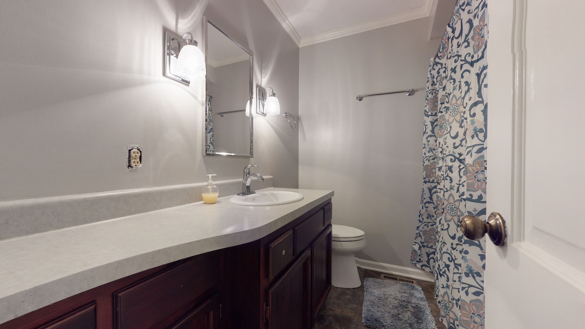 4741 Cathey Ridge Road Manchester, TN 37355 - Photo 40 of 50 a bathroom with a sink a toilet a shower and a mirror