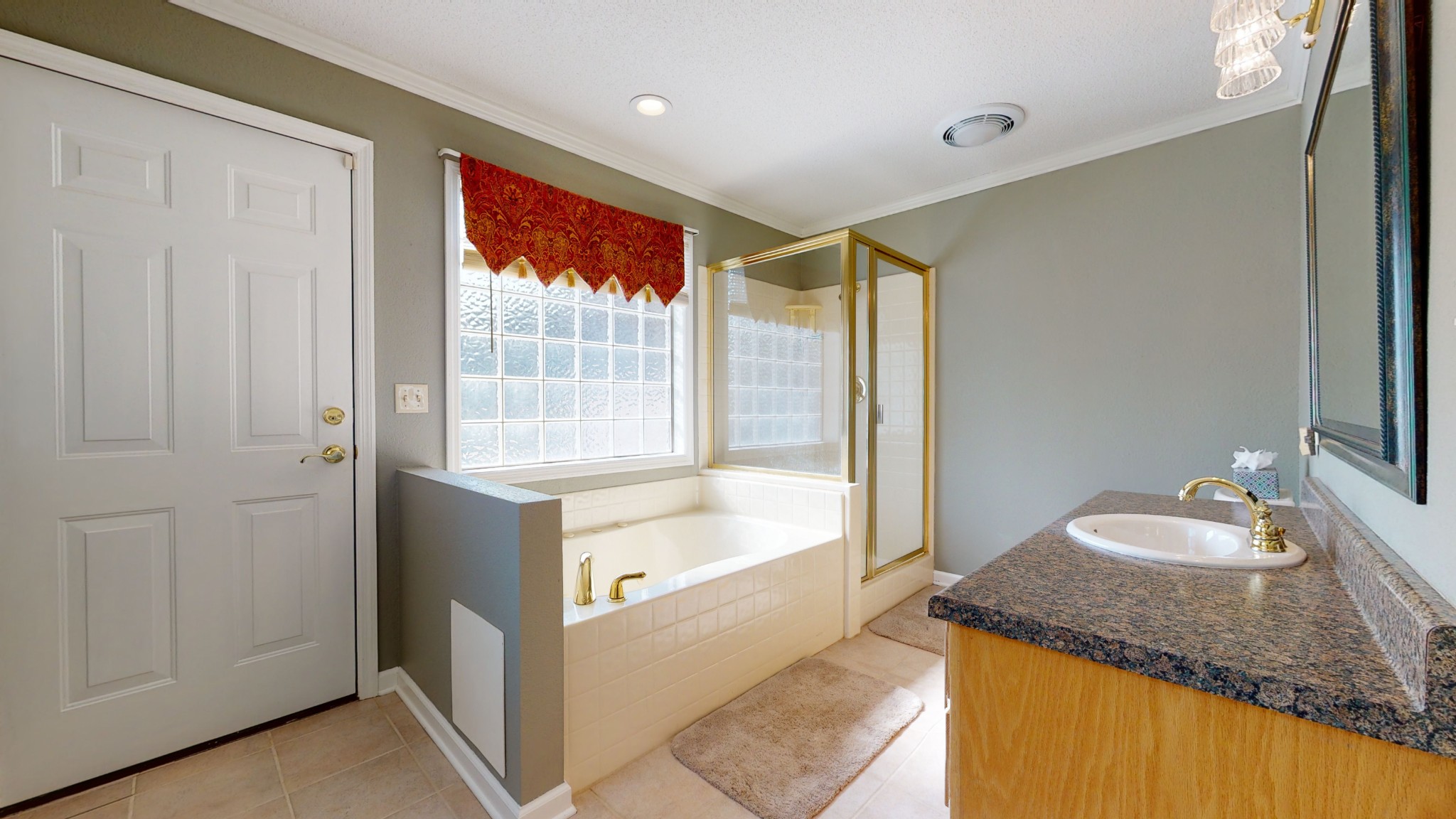 4741 Cathey Ridge Road Manchester, TN 37355 - Photo 42 of 50 a bathroom with a granite countertop sink and a mirror