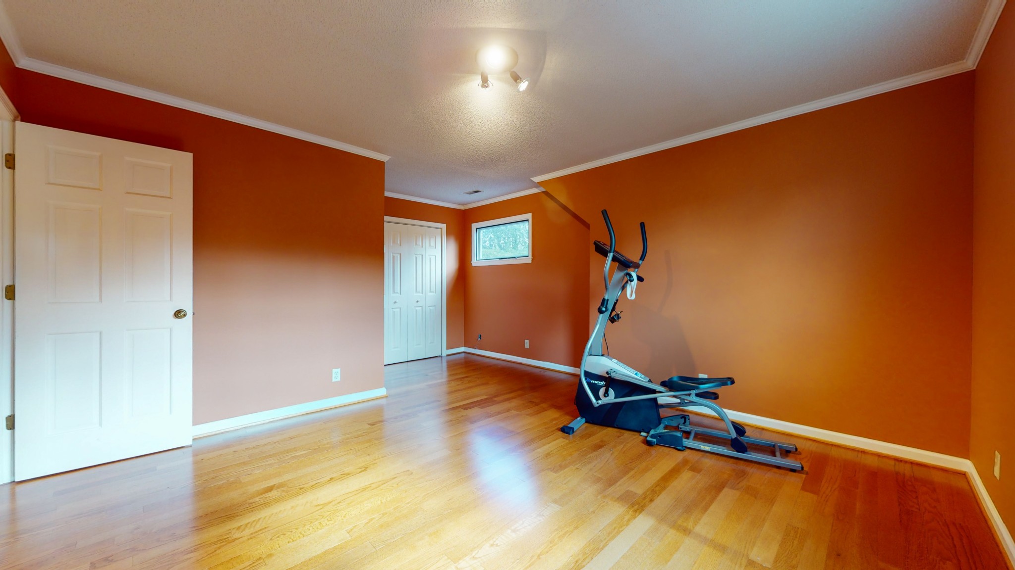 4741 Cathey Ridge Road Manchester, TN 37355 - Photo 46 of 50 a room with gym equipment and wooden floor