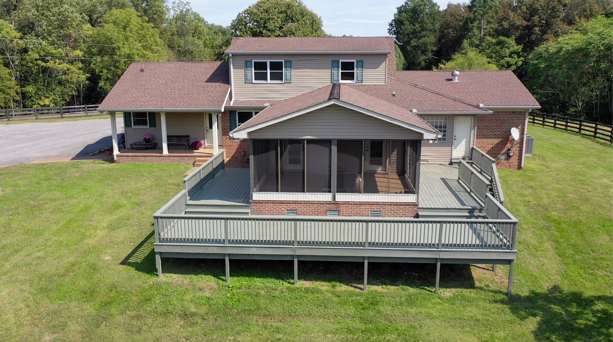 4741 Cathey Ridge Road Manchester, TN 37355 - Photo 7 of 50 a aerial view of a house with a yard table and chairs