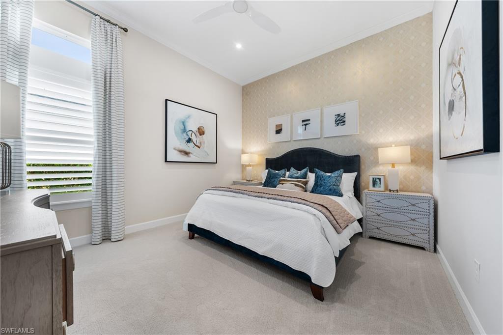 15266 Arpino Court Naples, FL 34114 - Photo 20 of 48 a bedroom with a bed and a painting on the wall