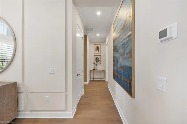 a bathroom with a sink toilet vanity and shower