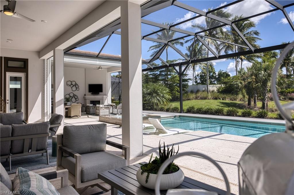 15266 Arpino Court Naples, FL 34114 - Photo 37 of 48 a view of balcony with furniture