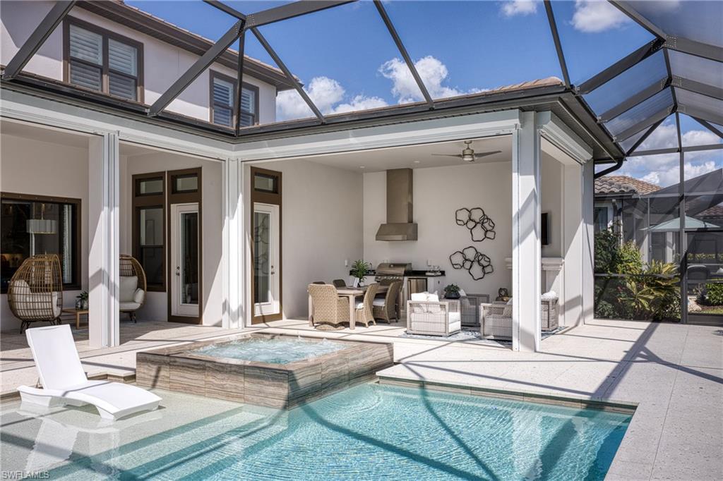 15266 Arpino Court Naples, FL 34114 - Photo 38 of 48 a view of the patio of the house