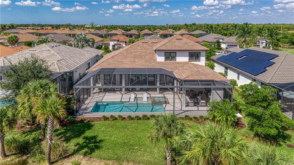 15266 Arpino Court Naples, FL 34114 - Photo 41 of 48 an aerial view of a house