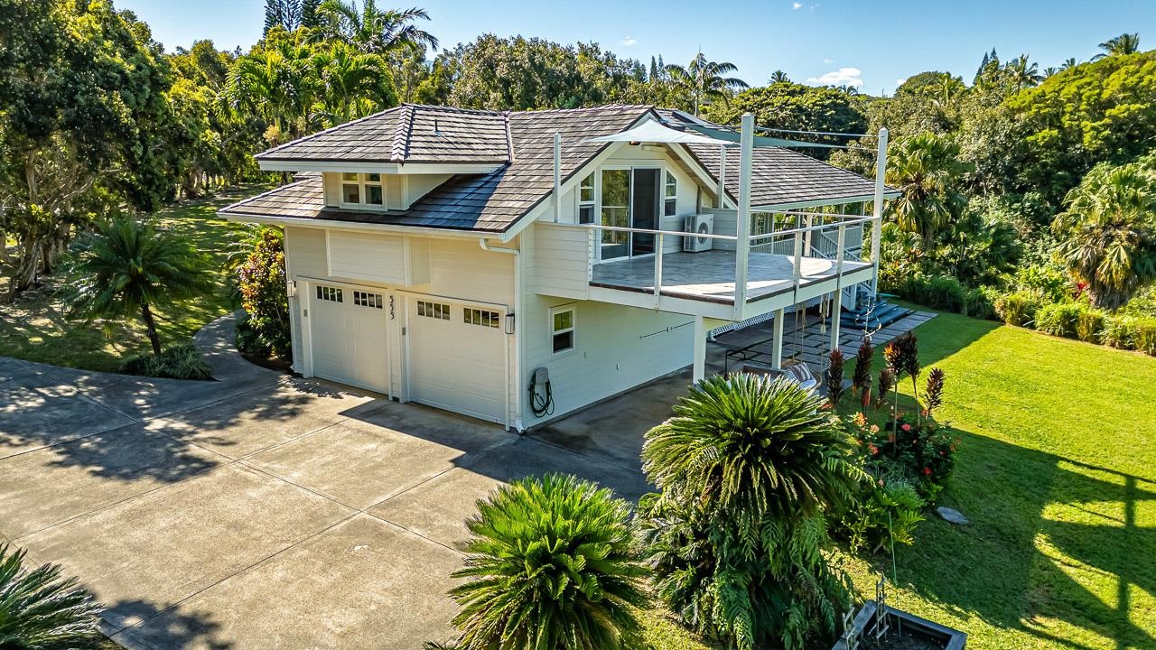 555 North Holokai Road Haiku, HI 96708 - Photo 38 of 50 The upstairs primary suite deck covers an optional carport or car washing station