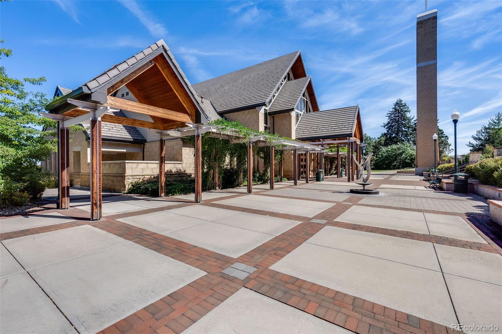 5240 Stuart Street Denver, CO 80212 - Photo 36 of 42 a front view of a house with a yard