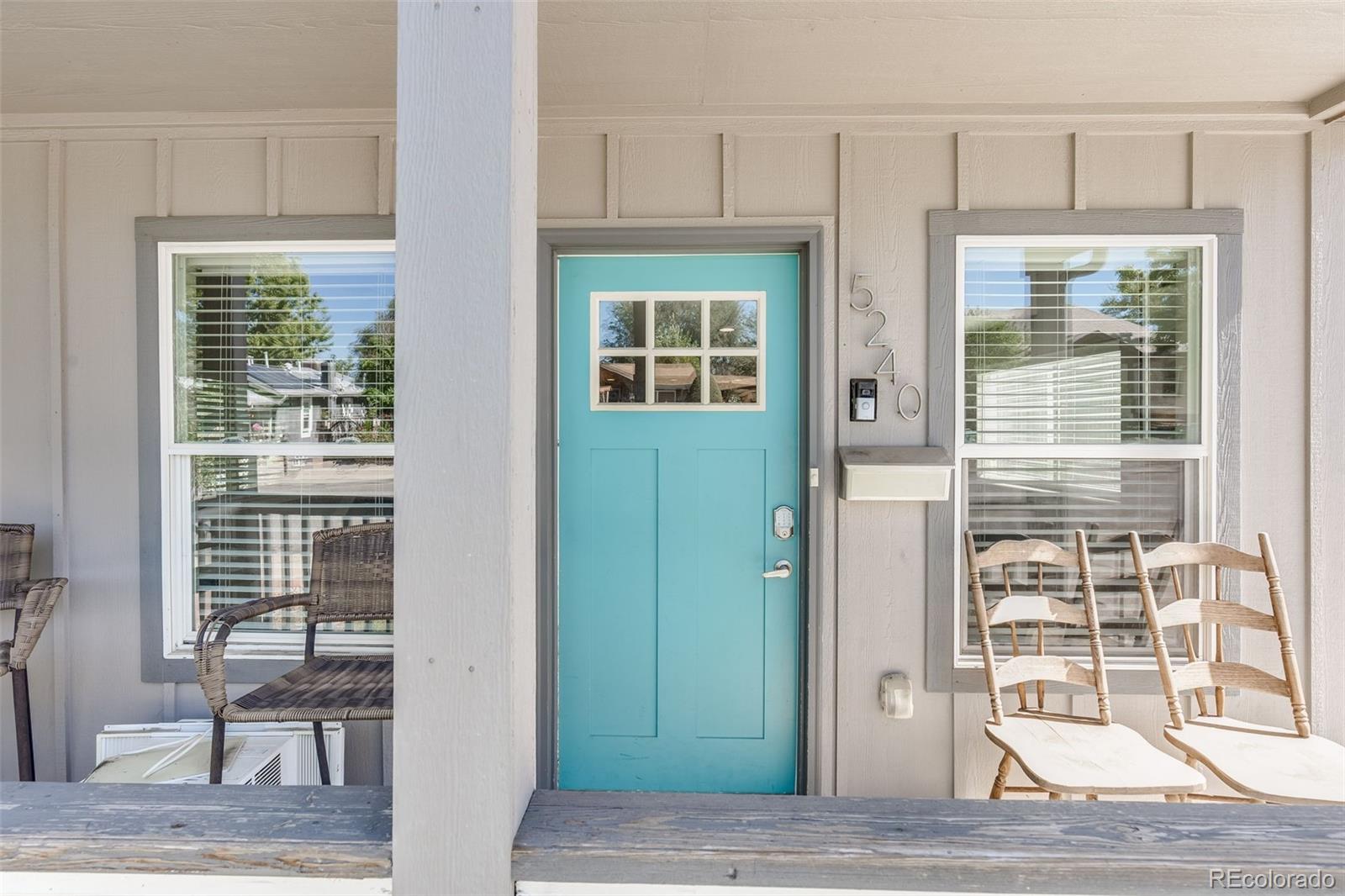 5240 Stuart Street Denver, CO 80212 - Photo 4 of 42 a view of front door with wooden floor
