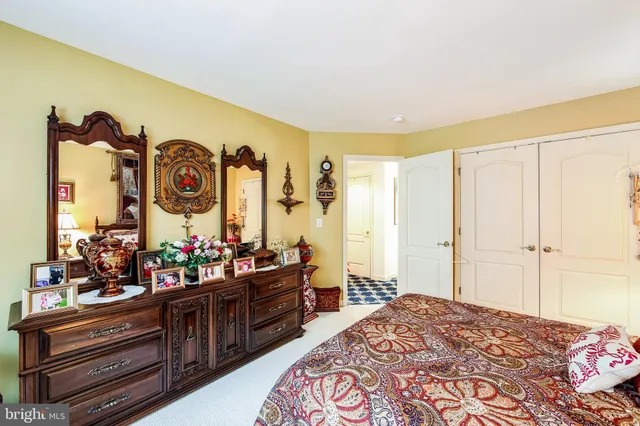a bathroom with a bathtub and a shower curtain