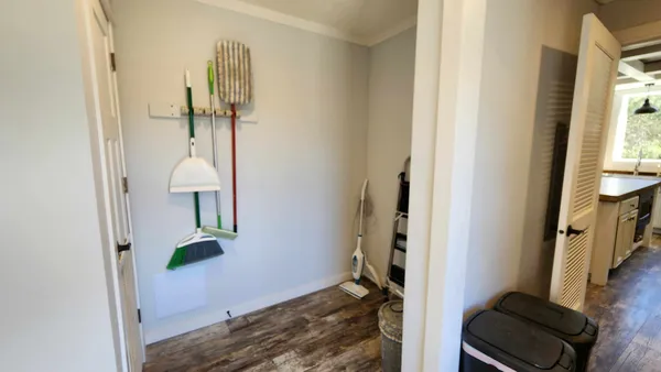 a backyard of a house with lots of green space