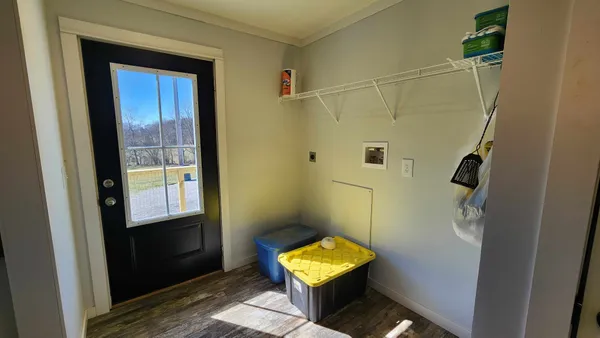 a view of swimming pool with a patio and outdoor seating