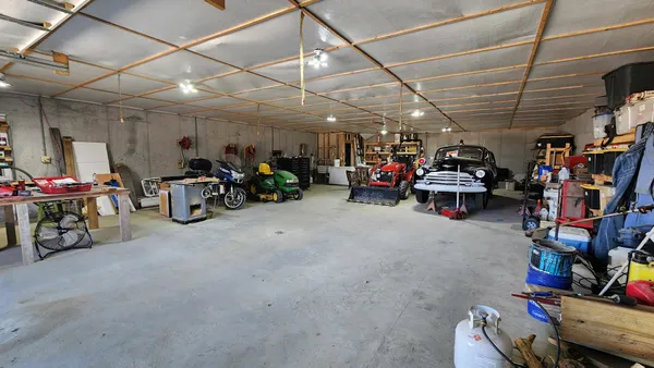 a view of a dry yard covered with snow