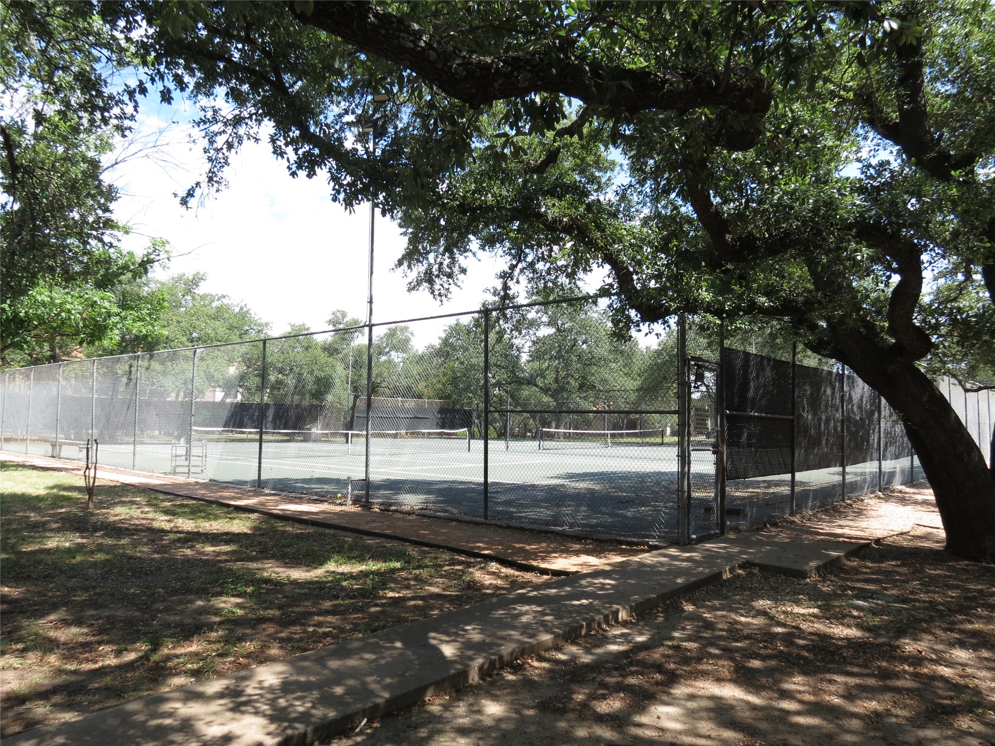 4159 Steck Avenue, Unit 269 Austin, TX 78759 - Photo 19 of 21 Sporting activity awaits on this well-maintained community tennis court.