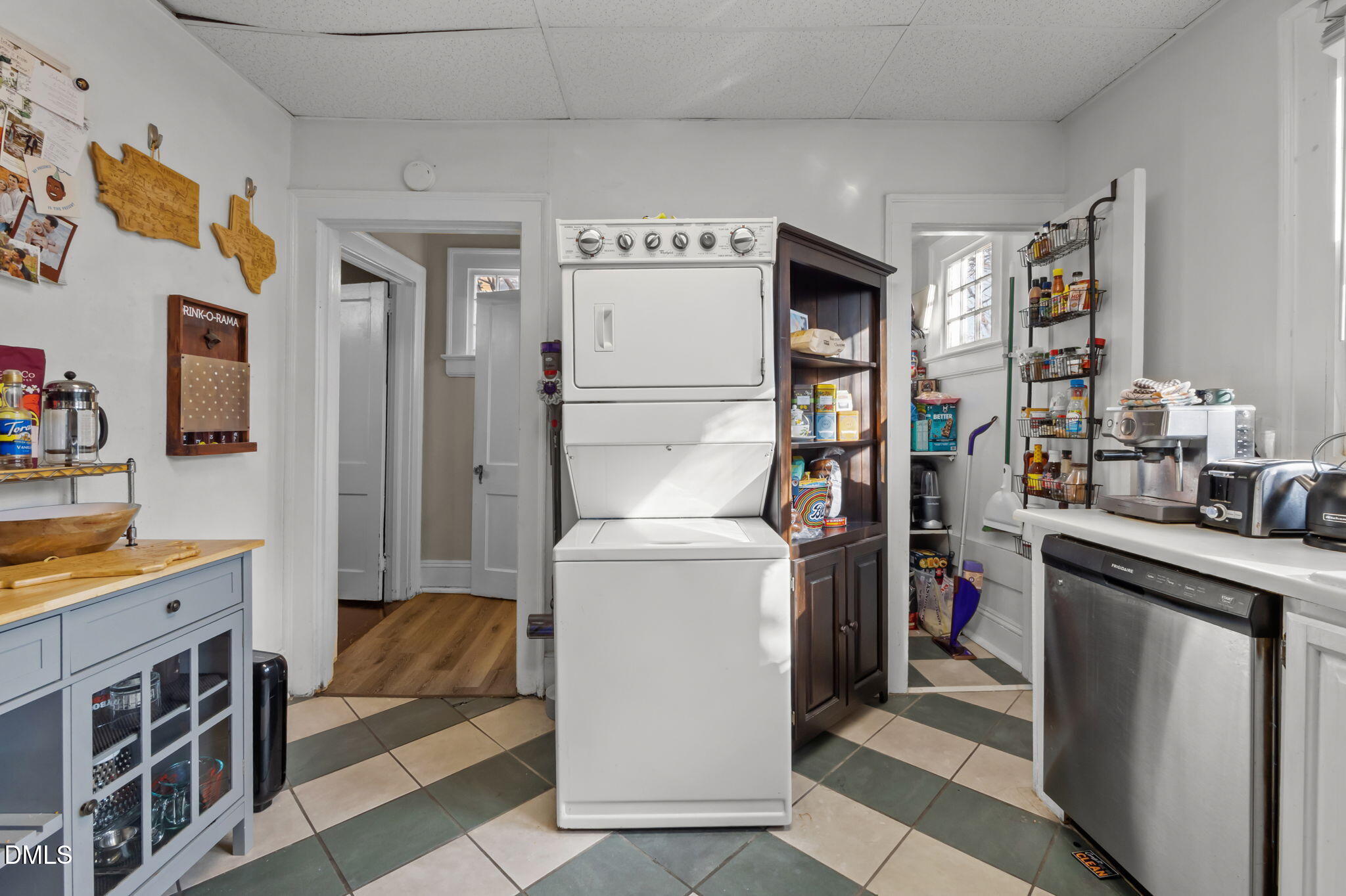 813 Arnette Avenue Durham, NC 27701 - Photo 16 of 31 a living room with furniture and a refrigerator