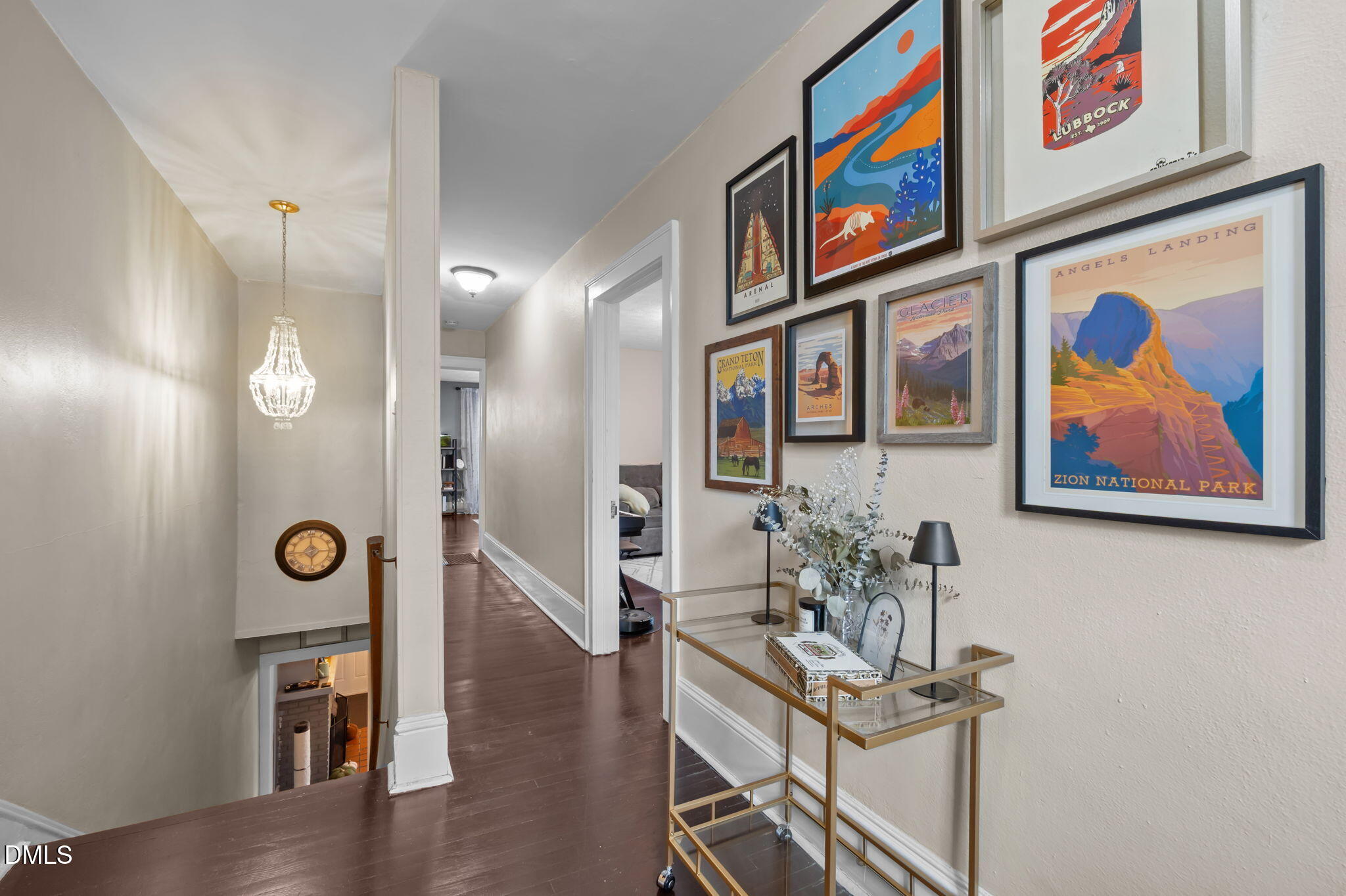 813 Arnette Avenue Durham, NC 27701 - Photo 17 of 31 a view of a hallway with wooden floor and furniture