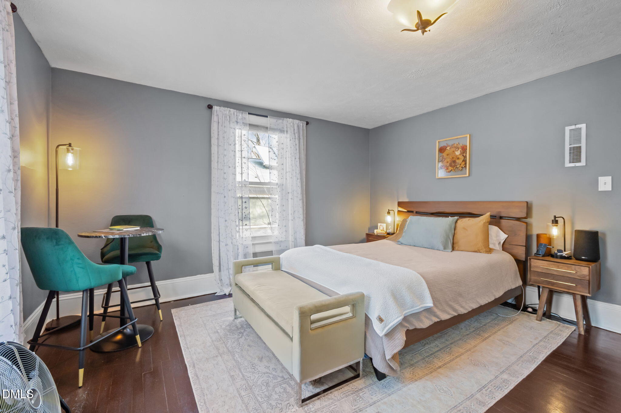 813 Arnette Avenue Durham, NC 27701 - Photo 24 of 31 a bedroom with a bed and a table