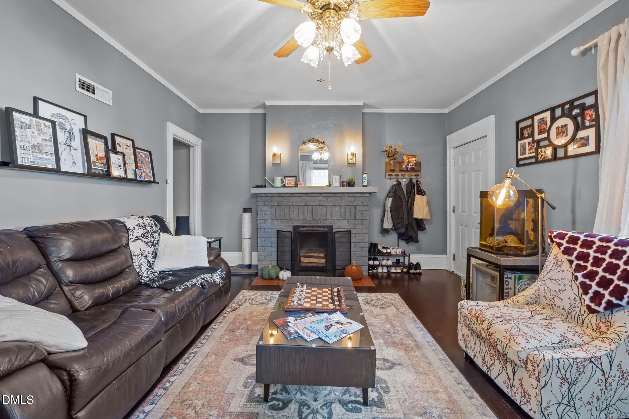813 Arnette Avenue Durham, NC 27701 - Photo 5 of 31 a living room with furniture and a fireplace